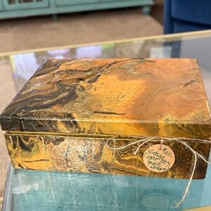 Vintage upscale cigar box. Glazed cover. 8” x 6”. Gold leaf interior.